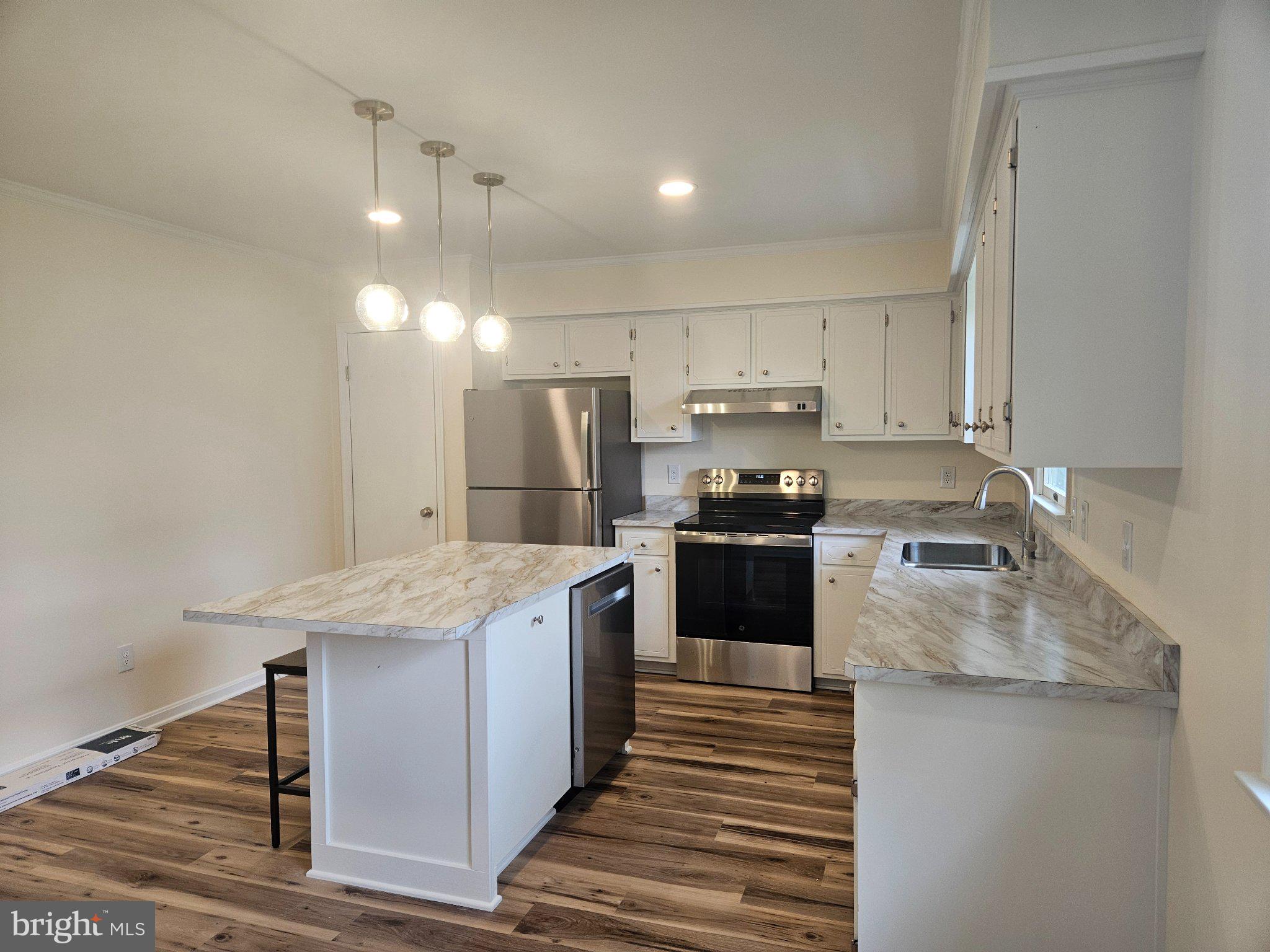 5 7th Street Ridgely, MD 21660 - Photo 4 of 12 Modern kitchen with sleek finishes.
