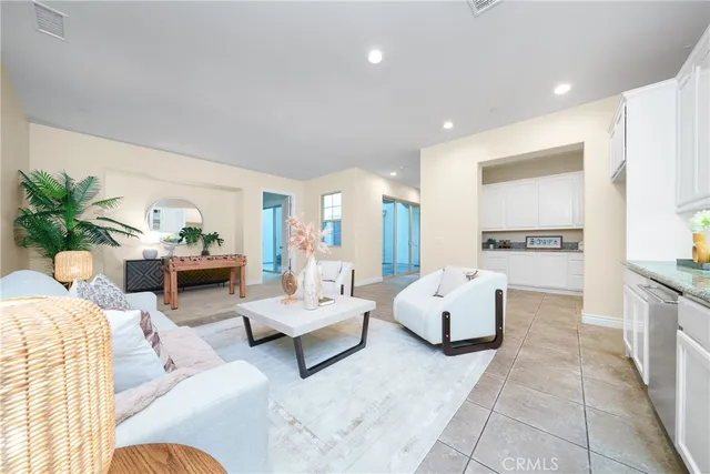 a view of kitchen cabinets and white appliances