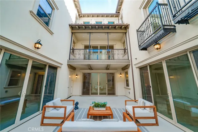 a backyard of a house with seating space