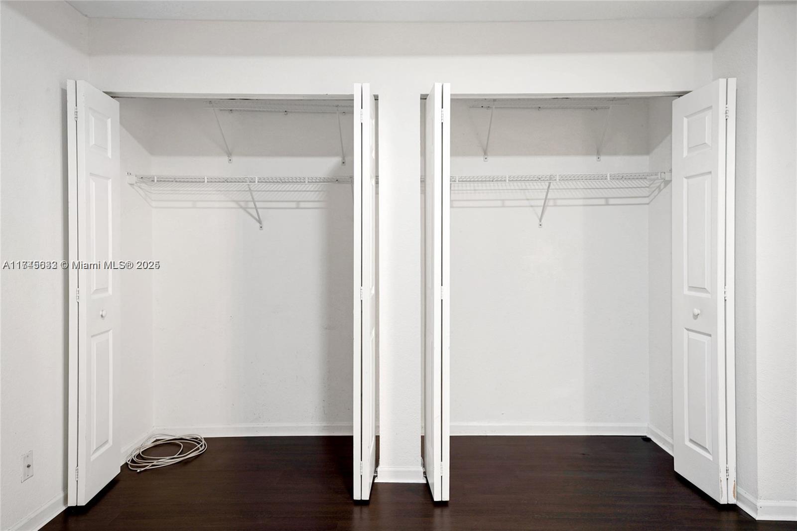 3903 Tree Top Drive Weston, FL 33332 - Photo 12 of 18 an empty room with wooden floor