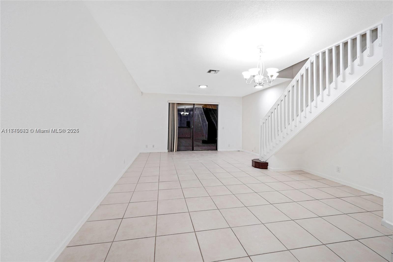 3903 Tree Top Drive Weston, FL 33332 - Photo 2 of 18 a view of an entryway with a window