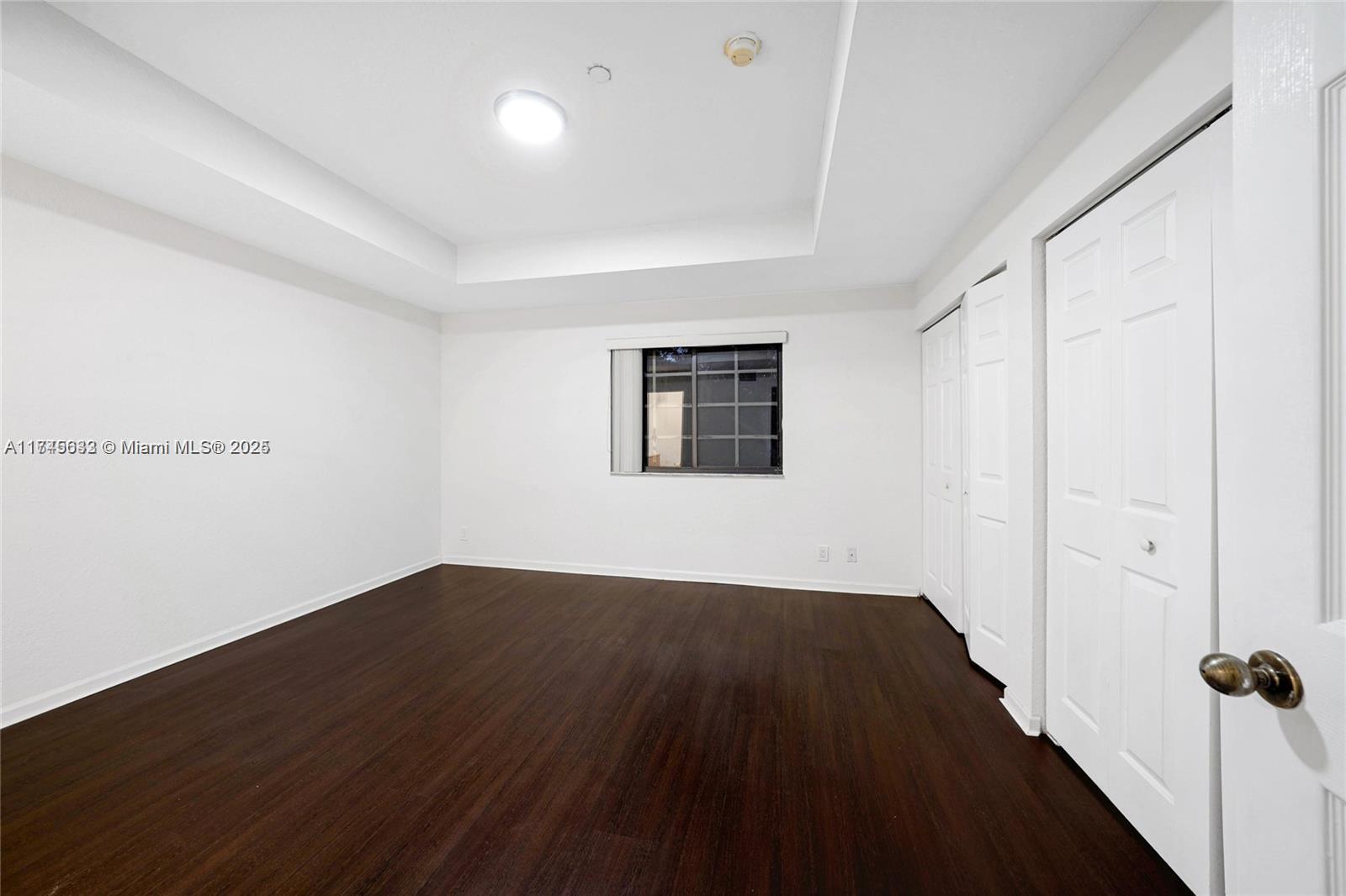 3903 Tree Top Drive Weston, FL 33332 - Photo 10 of 18 an empty room with wooden floor