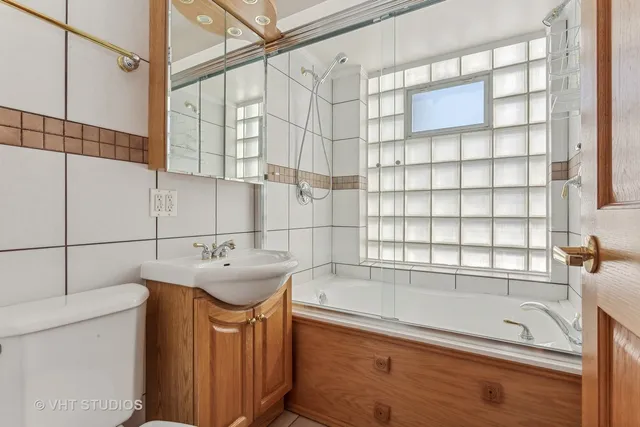 a bathroom with a sink and a bathtub