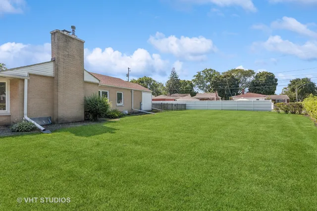 a house view with a garden space
