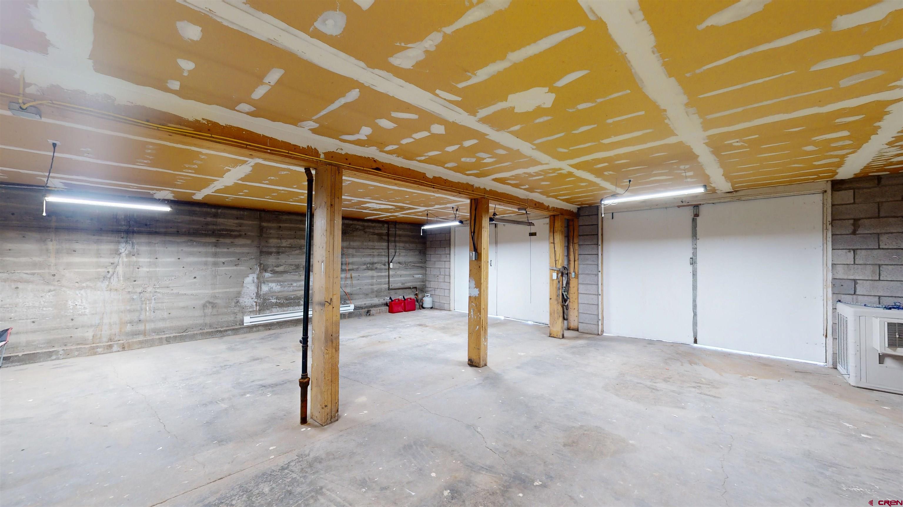 25615 Starner Loop Road Cedaredge, CO 81413 - Photo 31 of 42 a view of empty room with wooden floor