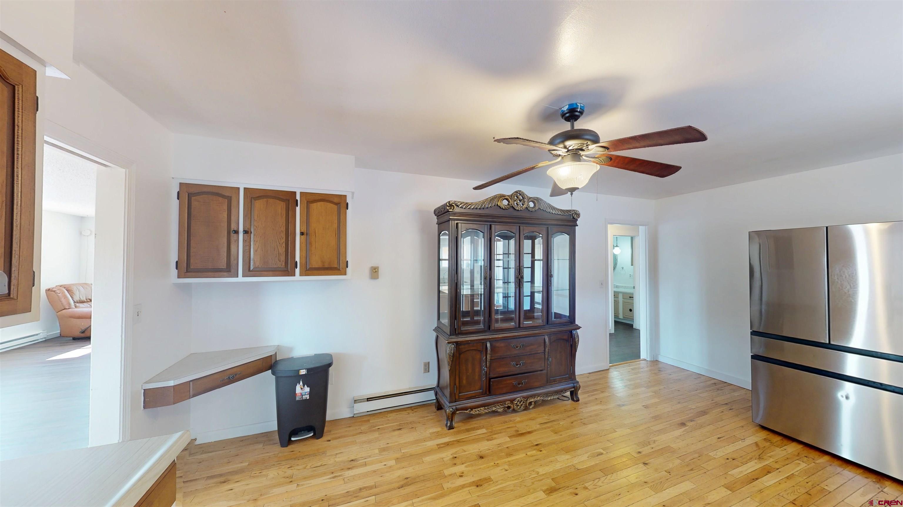 25615 Starner Loop Road Cedaredge, CO 81413 - Photo 9 of 42 a view of kitchen with furniture and refrigerator