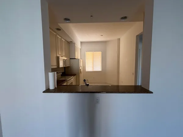 a view of a livingroom with a staircase