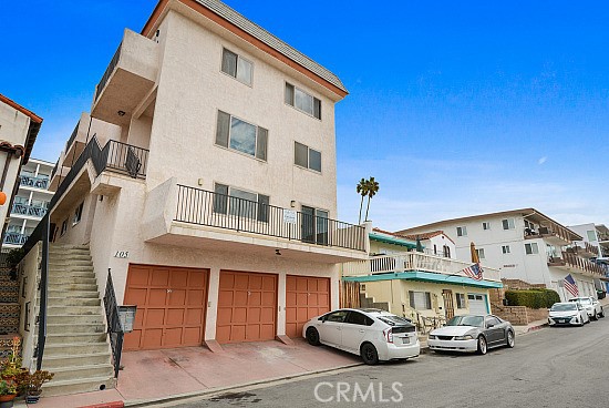105 Alameda, Unit A San Clemente, CA 92672 - Photo 1 of 7 a front view of a building with parking space