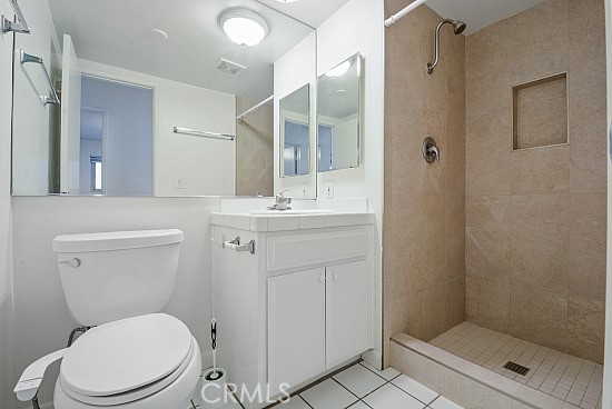 105 Alameda, Unit A San Clemente, CA 92672 - Photo 7 of 7 a bathroom with a toilet a sink and shower