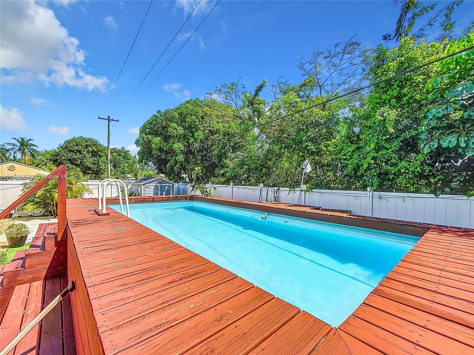 10324 Sleepy Brook Way Boca Raton, FL 33428 - Photo 22 of 29 a view of swimming pool with lounge chair