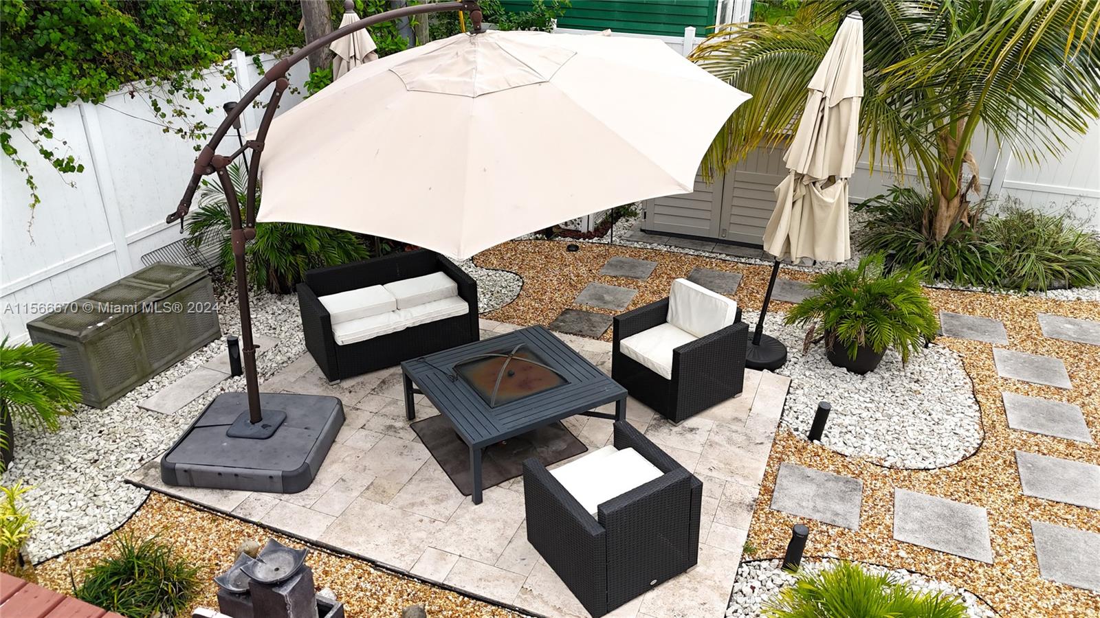 10324 Sleepy Brook Way Boca Raton, FL 33428 - Photo 24 of 29 an aerial view of a house with garden space and sitting space