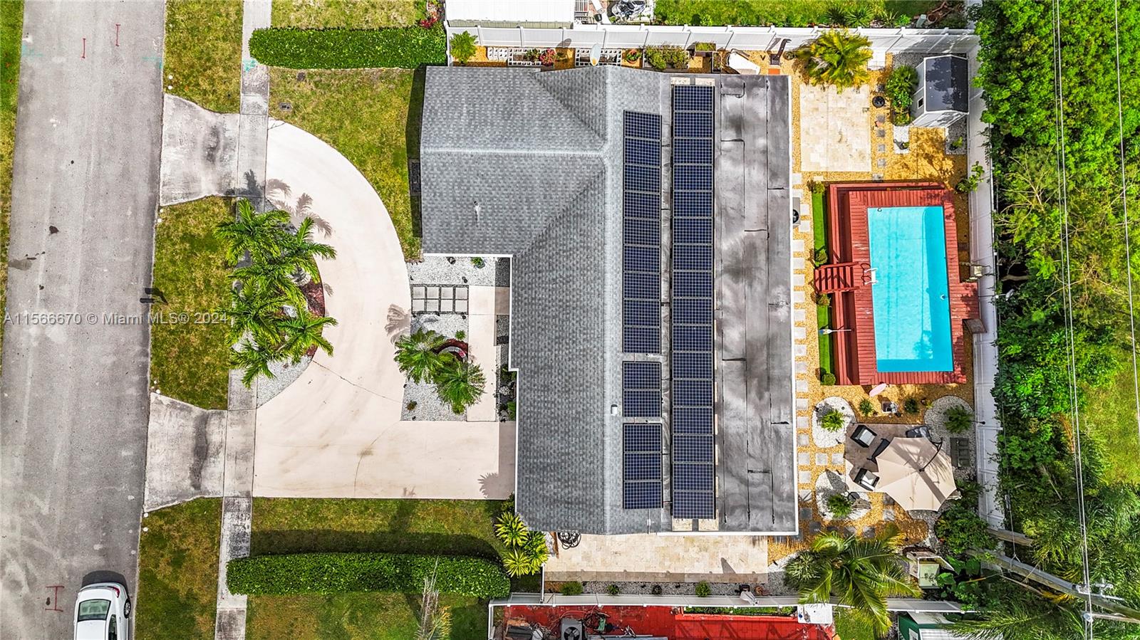 10324 Sleepy Brook Way Boca Raton, FL 33428 - Photo 26 of 29 front view of a house with a yard