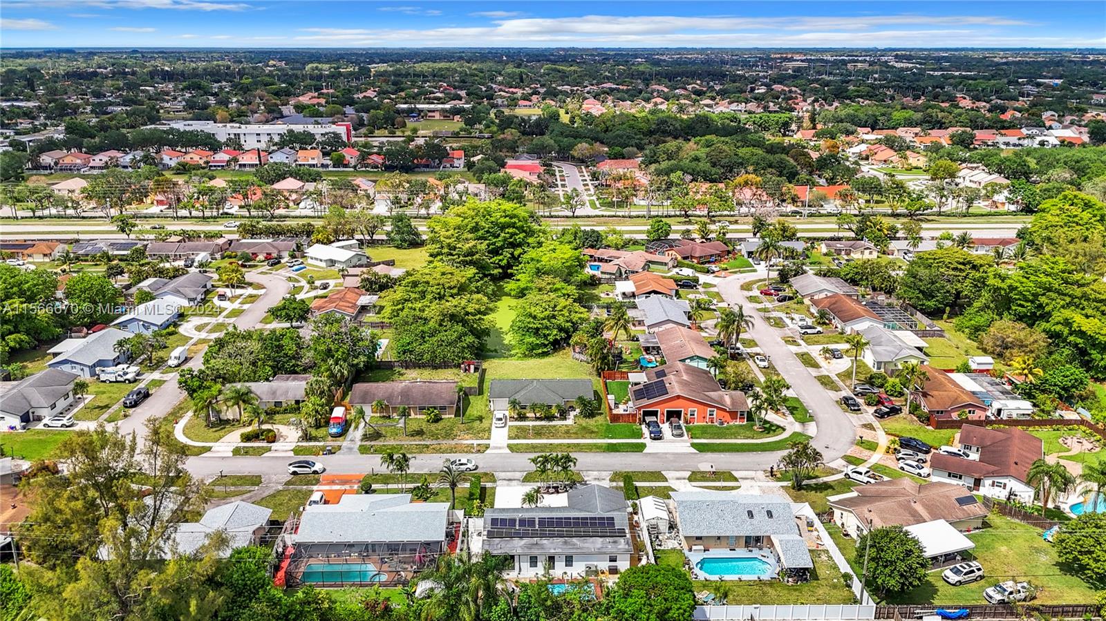 10324 Sleepy Brook Way Boca Raton, FL 33428 - Photo 27 of 29 an aerial view of residential houses with outdoor space