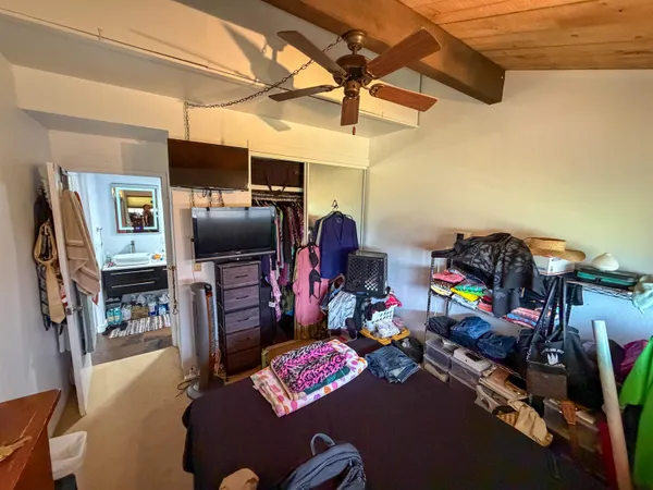 a view of a workspace with furniture