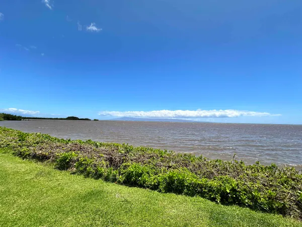 a view of a lake and sunset