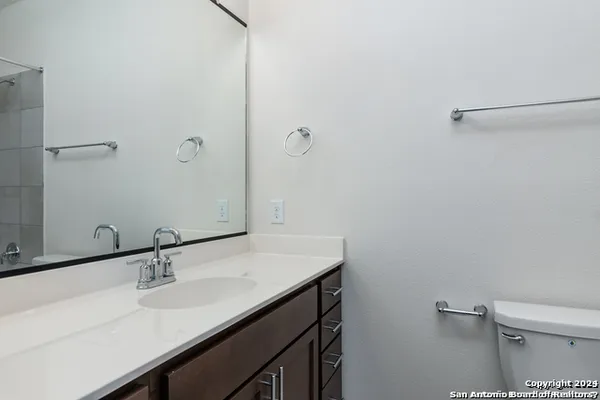 a bathroom with a sink and a toilet