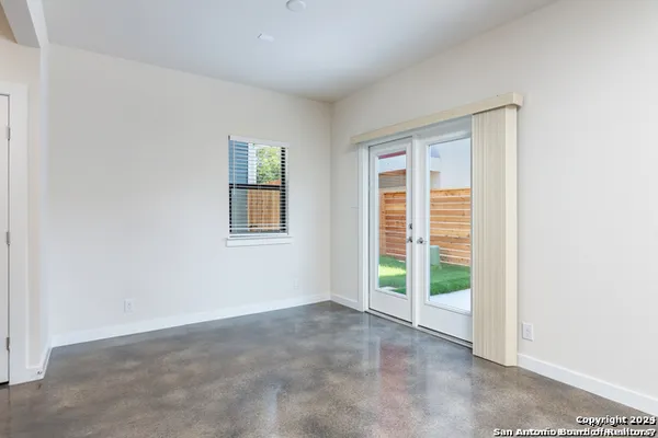 an empty room with windows