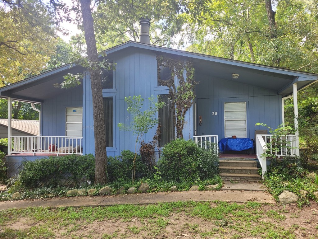 20 Connor Lane Huntsville, TX 77320 - Photo 1 of 41 a front view of a house with garden