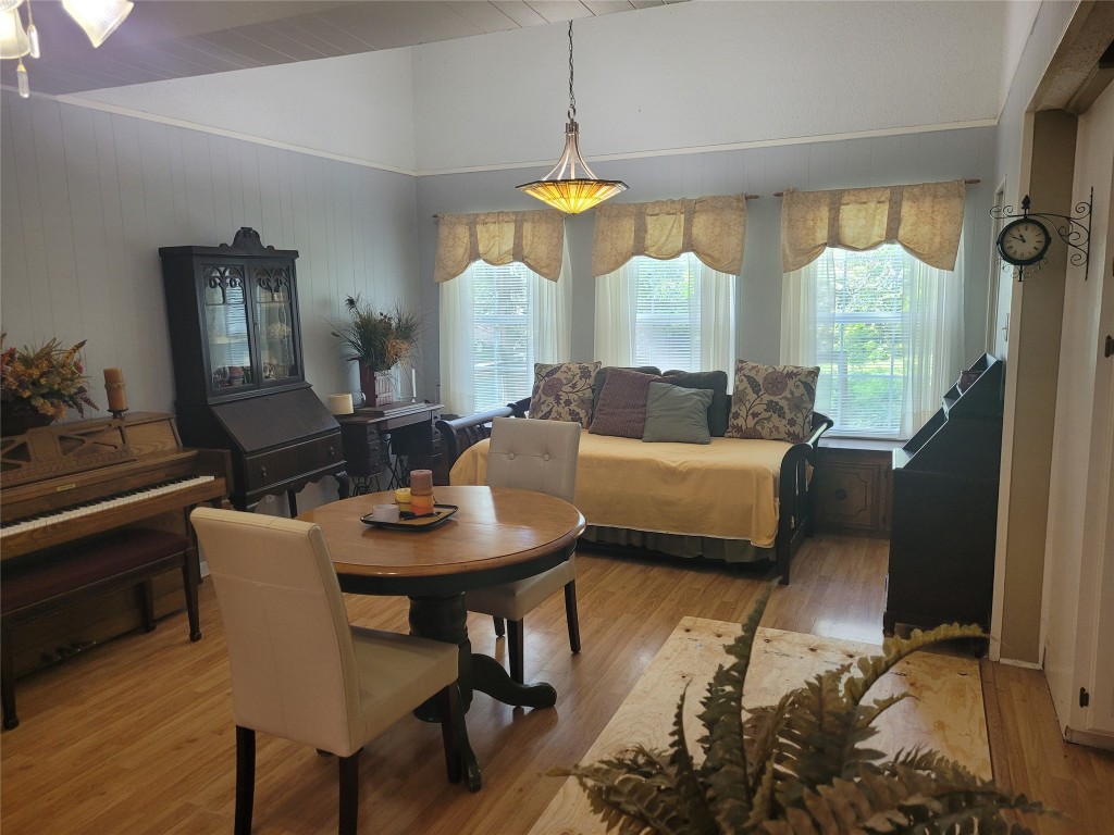 20 Connor Lane Huntsville, TX 77320 - Photo 19 of 41 a living room with furniture and a chandelier