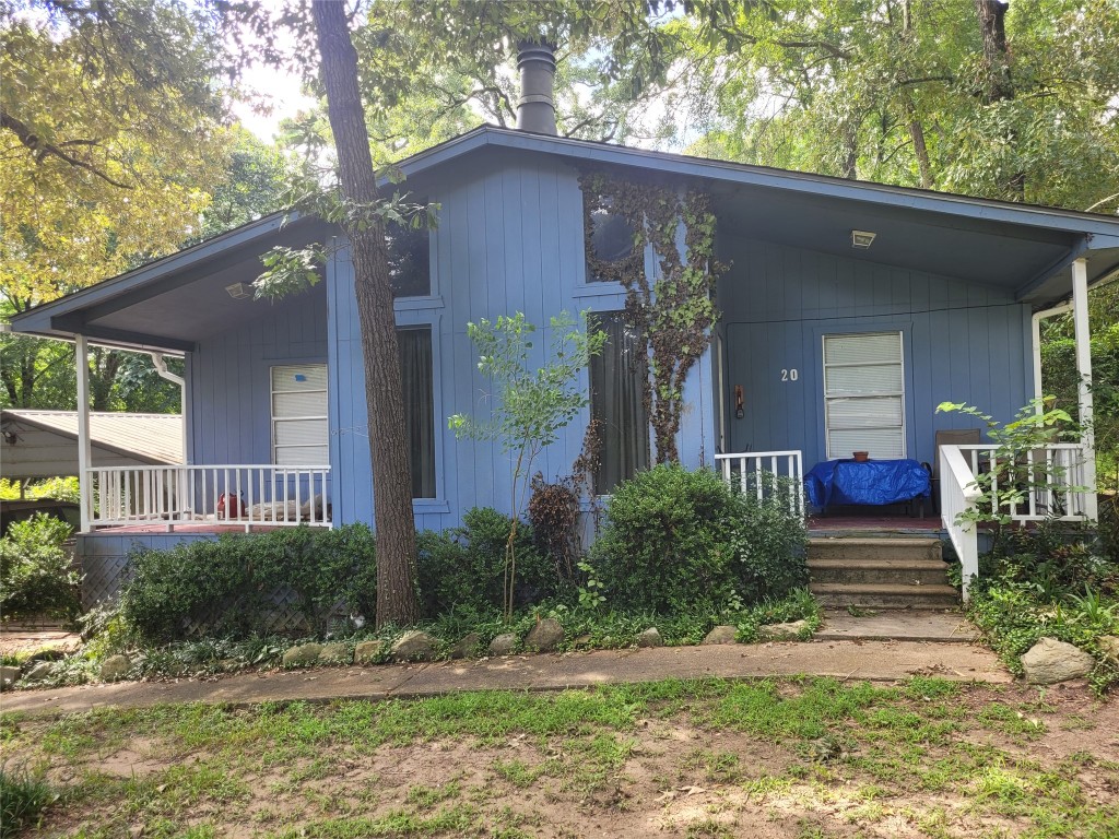 20 Connor Lane Huntsville, TX 77320 - Photo 2 of 41 a front view of a house with garden