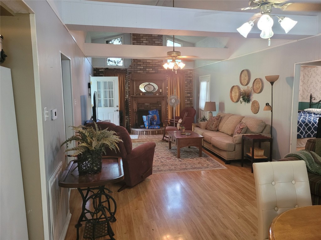 20 Connor Lane Huntsville, TX 77320 - Photo 21 of 41 a living room with furniture and a chandelier