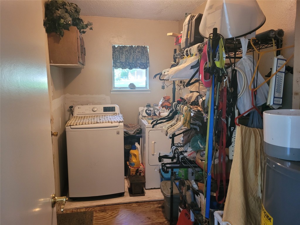 20 Connor Lane Huntsville, TX 77320 - Photo 30 of 41 a view of walk in closet with clothes and shoes