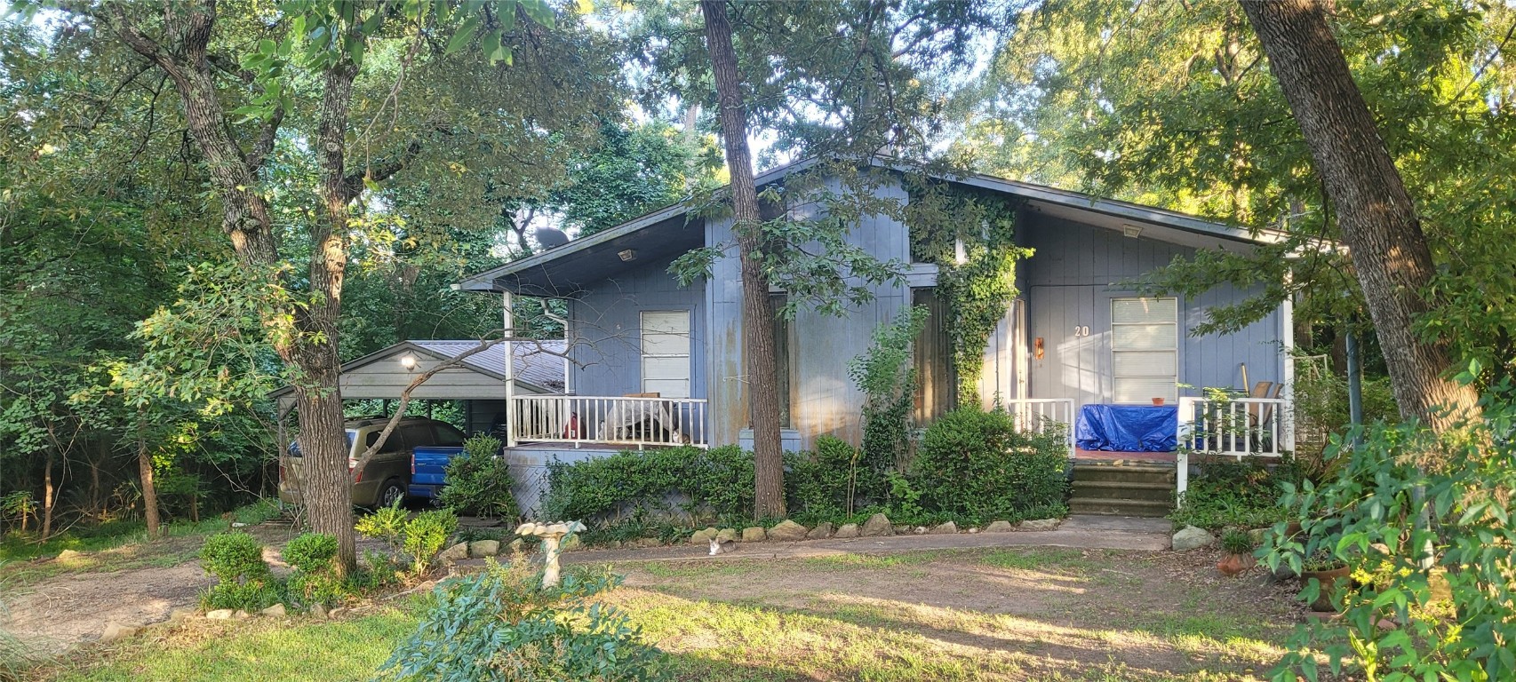 20 Connor Lane Huntsville, TX 77320 - Photo 8 of 41 a front view of a house with garden