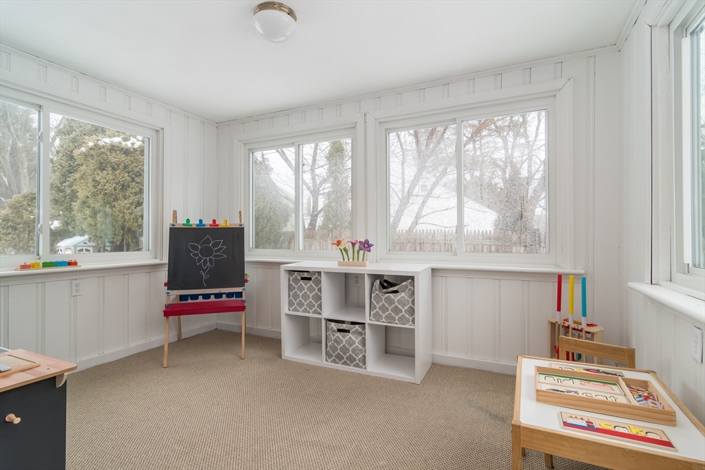 53 Bacon Street Natick, MA 01760 - Photo 12 of 30 a bedroom with furniture and a window