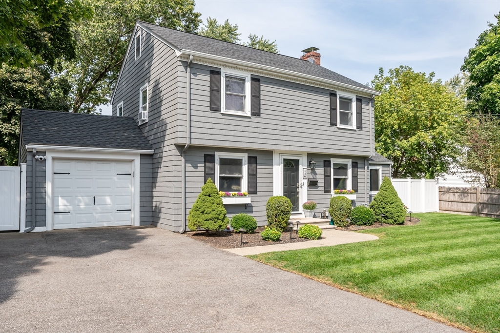 53 Bacon Street Natick, MA 01760 - Photo 2 of 30 front view of a house with a yard