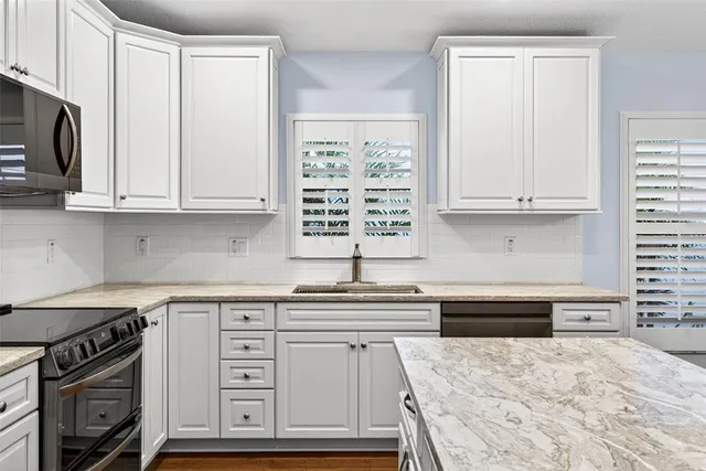 a front view of a house with a porch