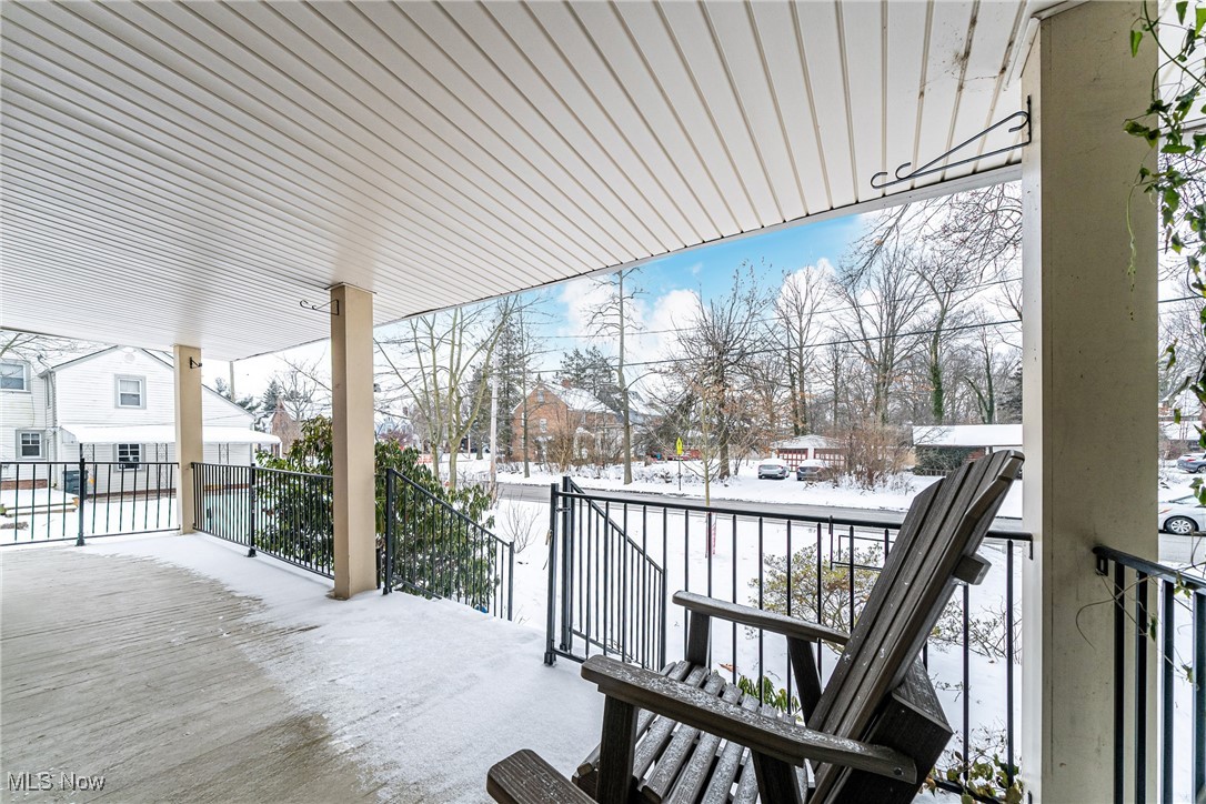 3733 Montevista Road Cleveland, OH 44121 - Photo 33 of 35 Snow covered deck featuring a porch
