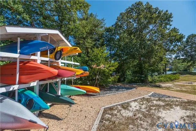 an outdoor space with patio and white umbrellas