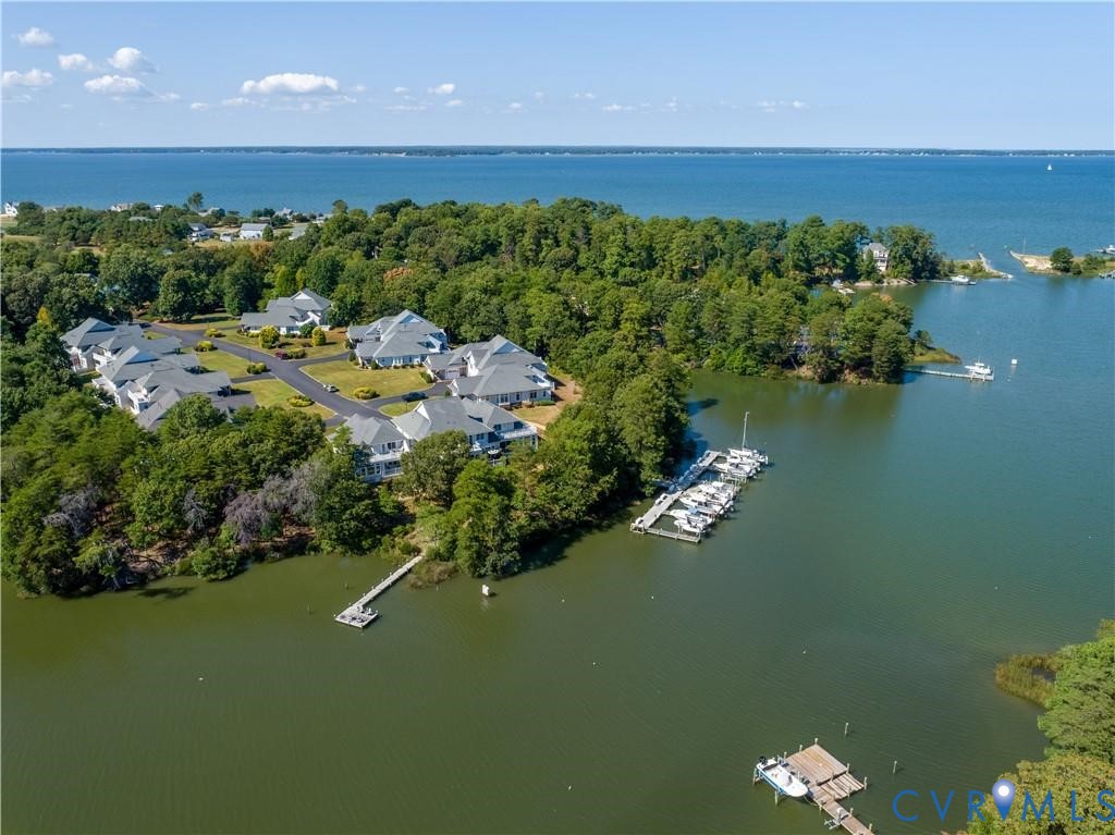 330 Chesapeake Watch Road, Unit 10B Deltaville, VA 23043 - Photo 29 of 48 a view of a lake with houses