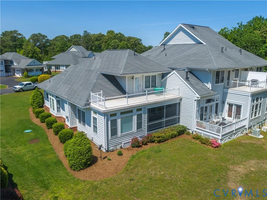 330 Chesapeake Watch Road, Unit 10B Deltaville, VA 23043 - Photo 33 of 48 a aerial view of a house with a yard