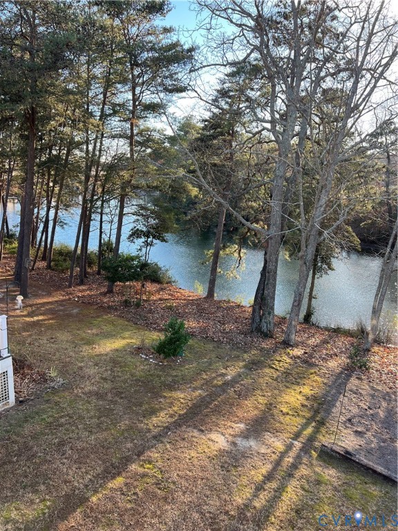 330 Chesapeake Watch Road, Unit 10B Deltaville, VA 23043 - Photo 45 of 48 a backyard of a house with lots of green space
