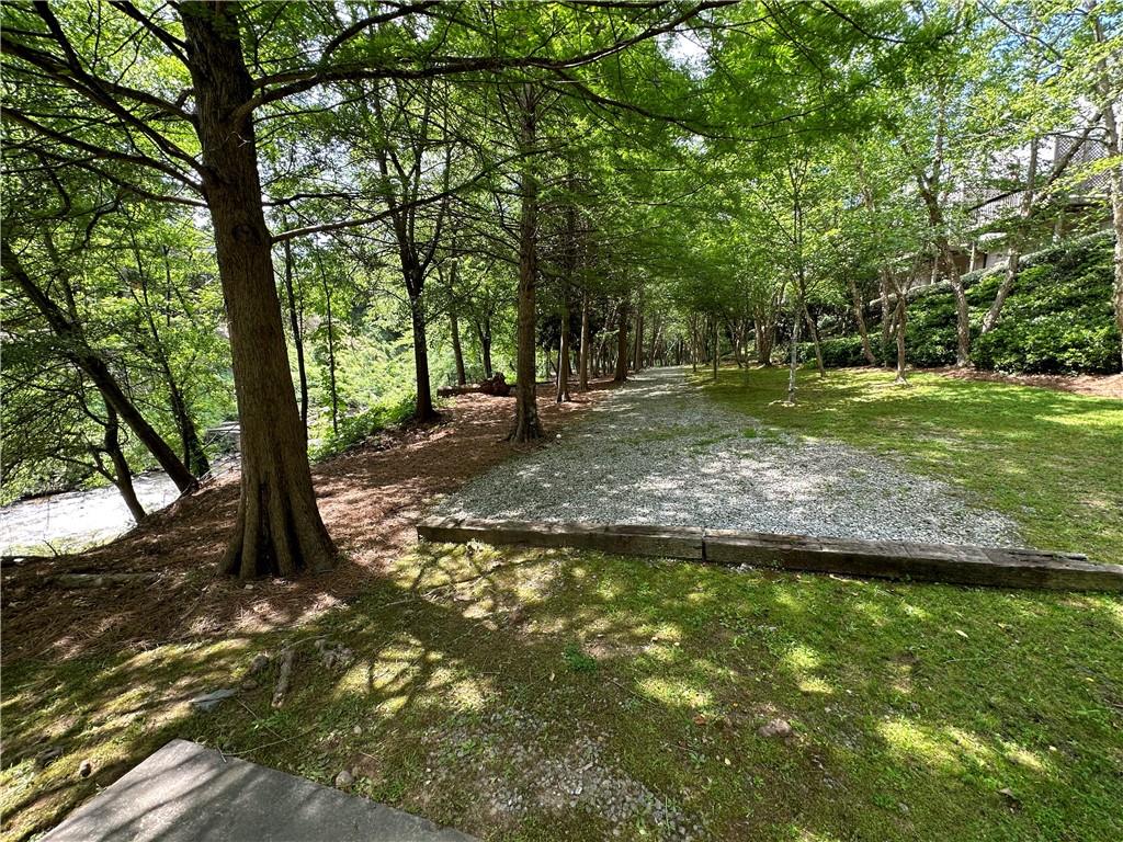 1615 Rivers Edge Trail Northeast Atlanta, GA 30324 - Photo 25 of 26 a view of a trees with a yard