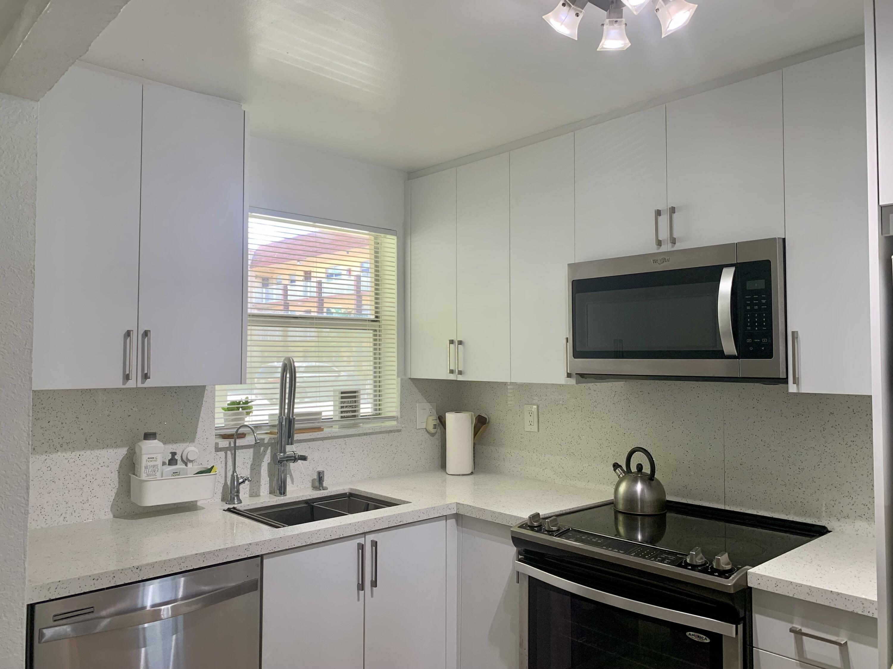 2801 North Pine Island Road, Unit 110 Sunrise, FL 33322 - Photo 4 of 7 IMG_2774
