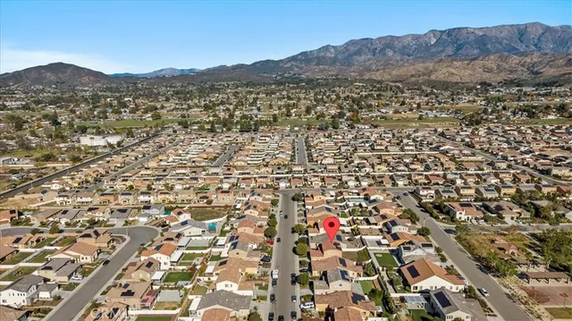 a picture of a bench in front of a wall