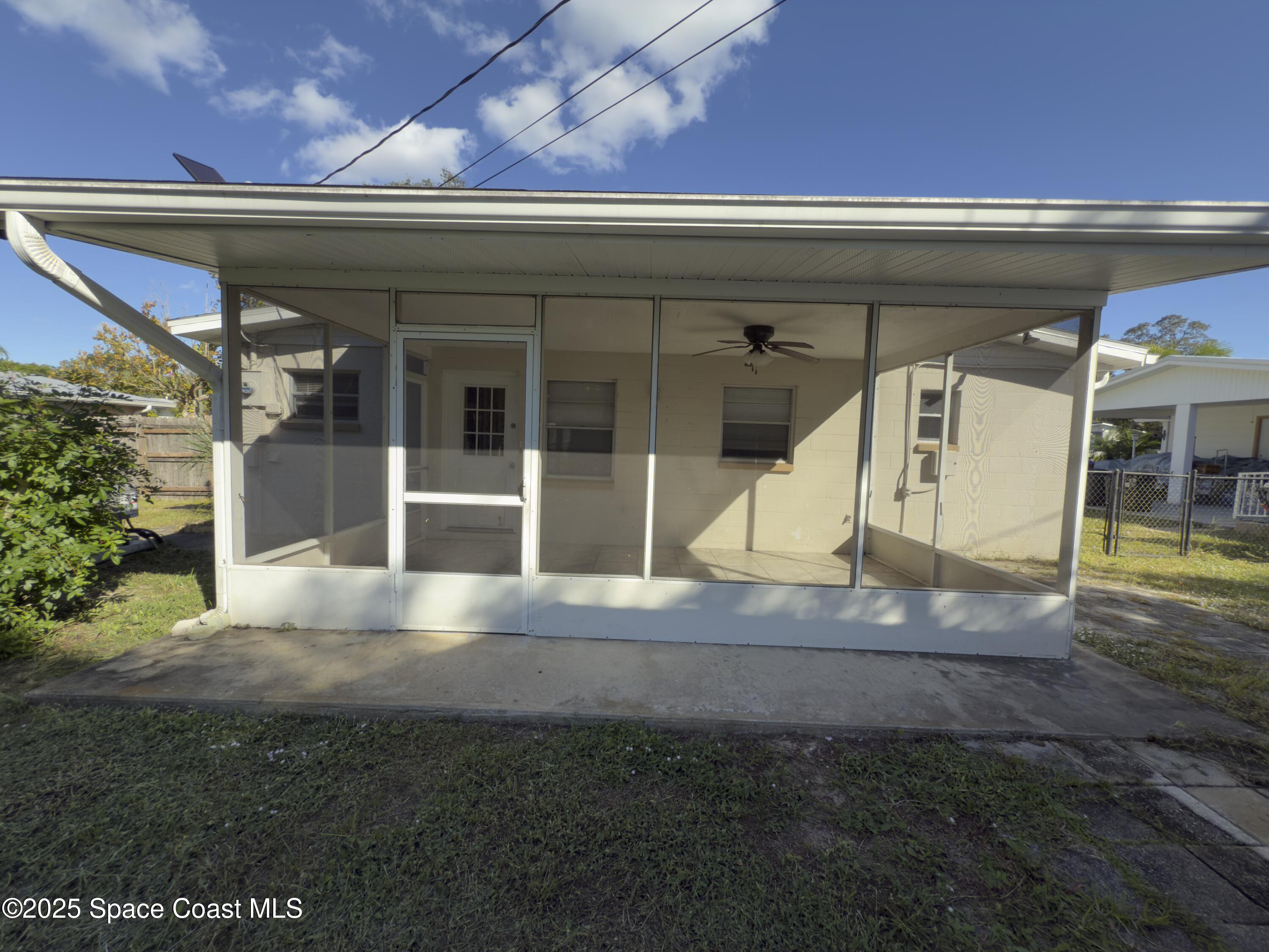 4530 Coleridge Avenue Titusville, FL 32780 - Photo 8 of 14 Screened back porch