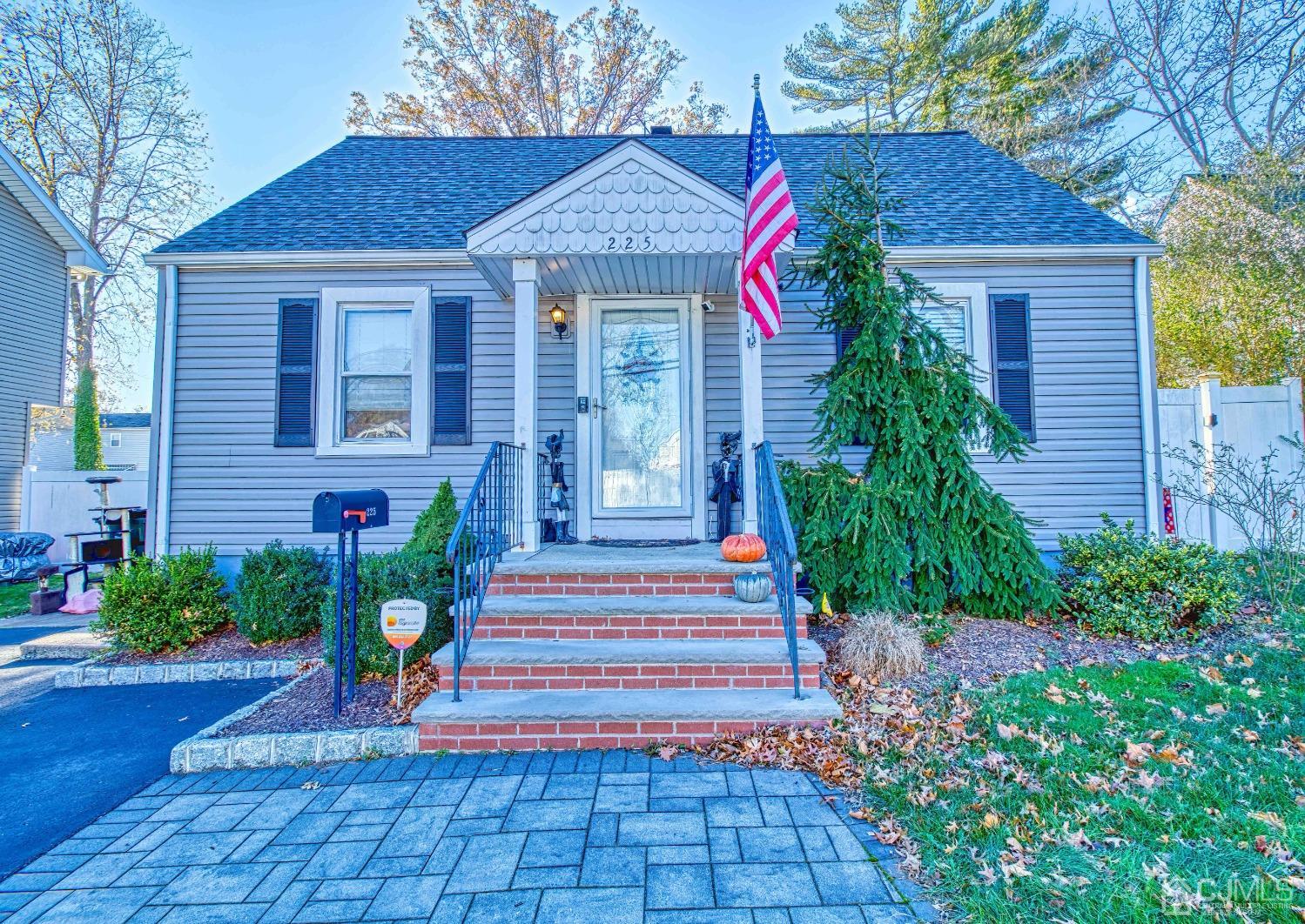 225 New Dover Road Colonia, NJ 07067 - Photo 1 of 33 a front view of a house with a yard