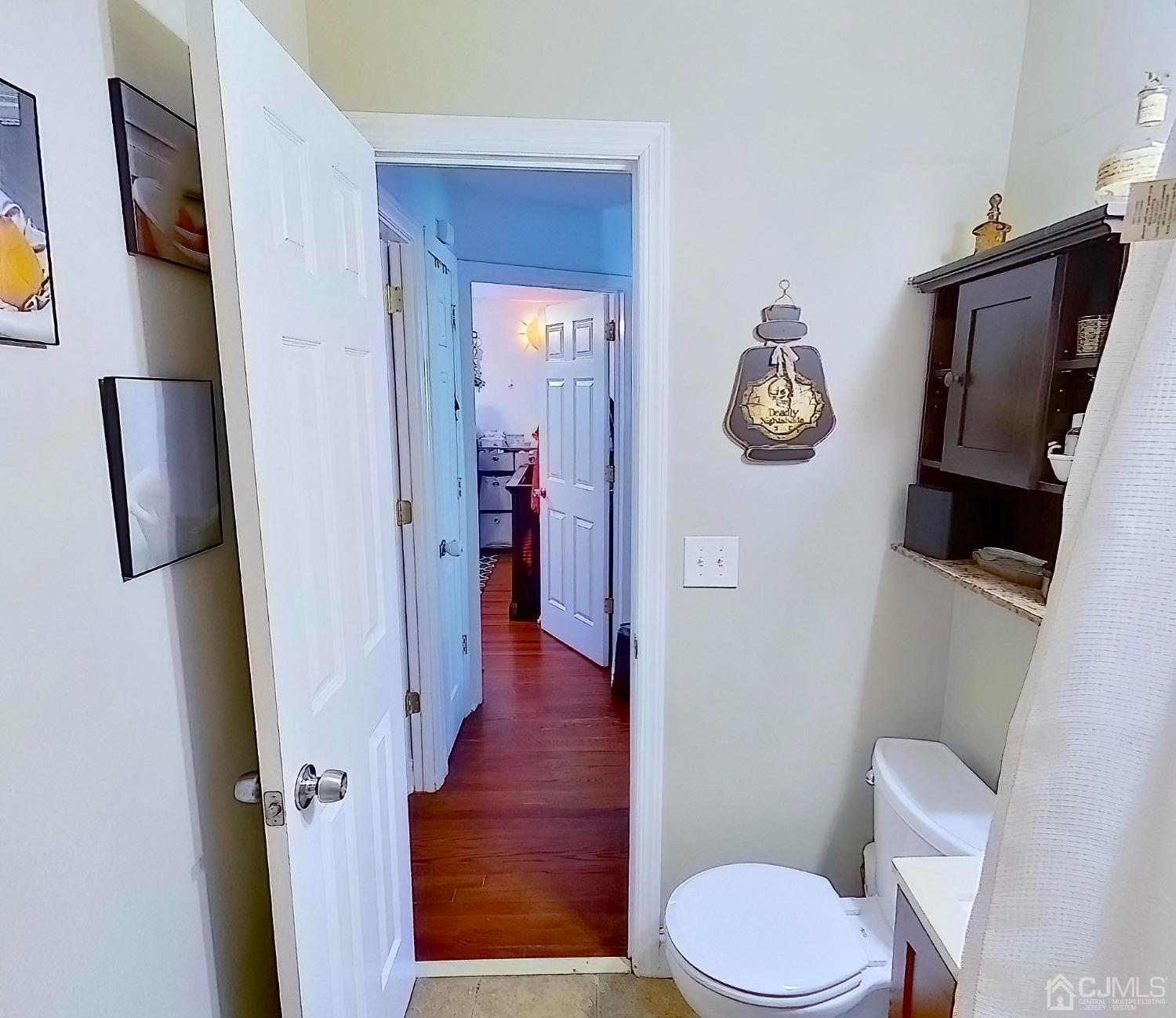 225 New Dover Road Colonia, NJ 07067 - Photo 15 of 33 a bathroom with a toilet and a shower