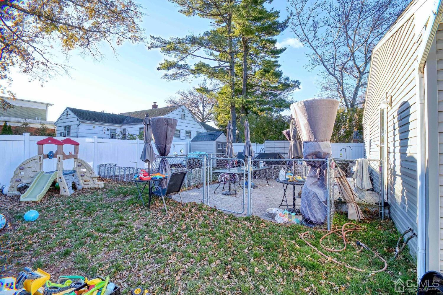 225 New Dover Road Colonia, NJ 07067 - Photo 30 of 33 an aerial view of a house with garden and outdoor seating