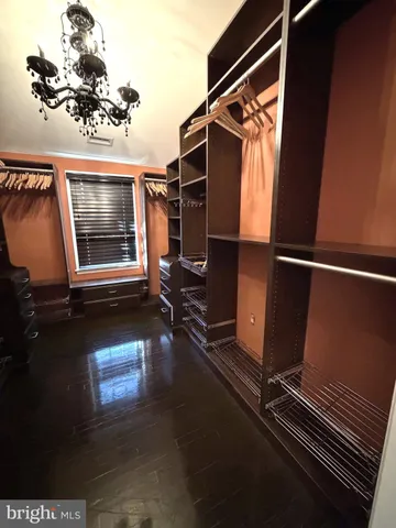 a room with gym equipment and a window