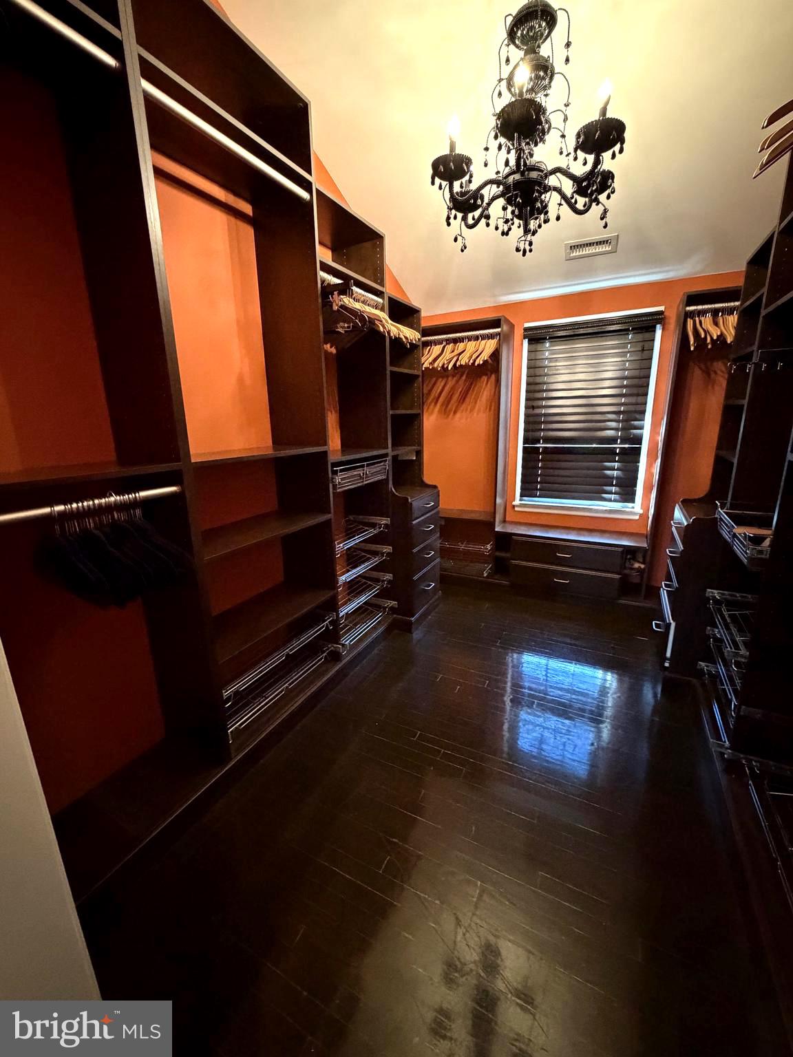 5103 Yuma Street Northwest Washington, DC 20016 - Photo 13 of 21 a living room with hard wood floors and a window