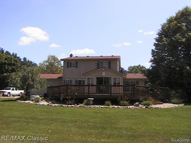 1935 Rowe Road Milford, MI 48380 - Photo 15 of 22 Wrap Around Deck in Rear