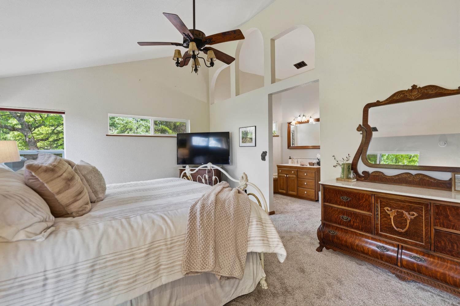 39000 Kearsarge Mill Road Alta, CA 95715 - Photo 24 of 65 a bedroom with a bed and a tv on the dresser