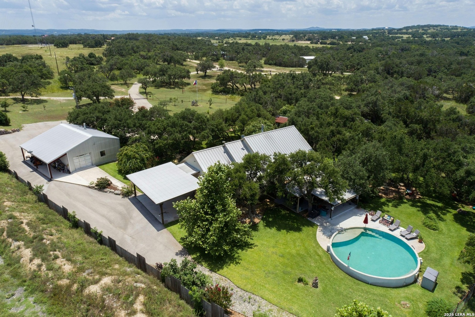 316 Go Away Road Blanco, TX 78606 - Photo 13 of 40 an aerial view of a house with a yard