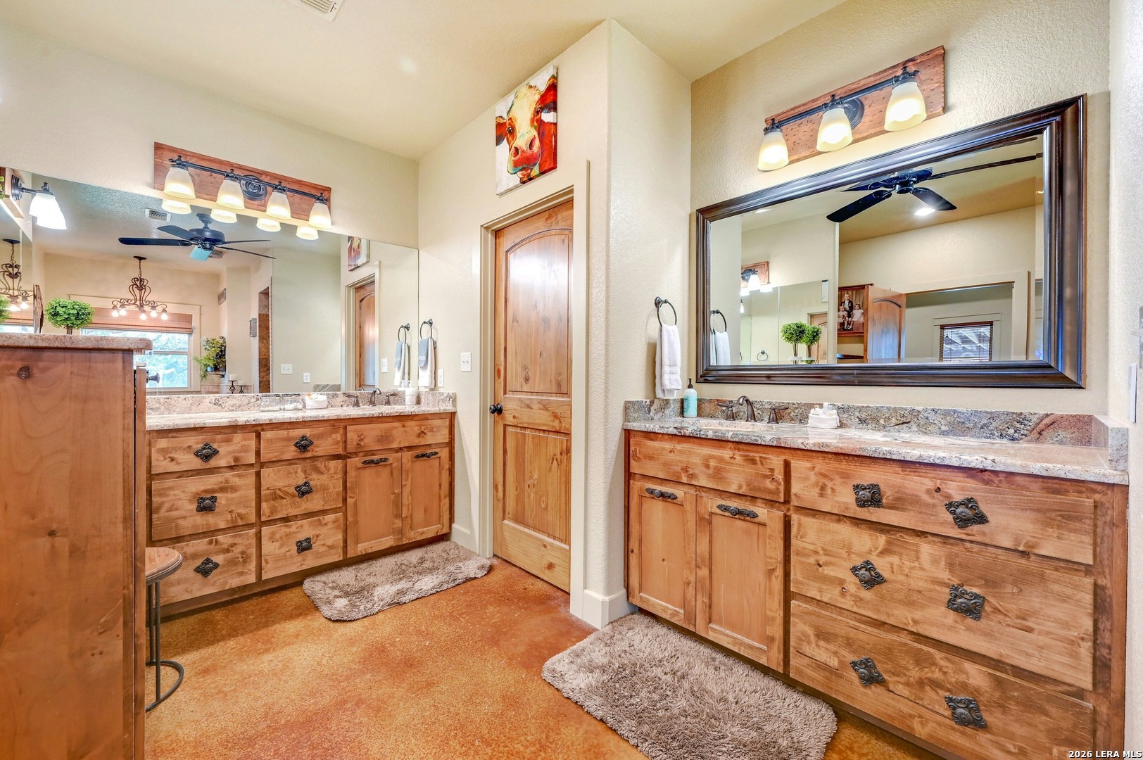 316 Go Away Road Blanco, TX 78606 - Photo 25 of 40 a bathroom with a sink a mirror and a vanity