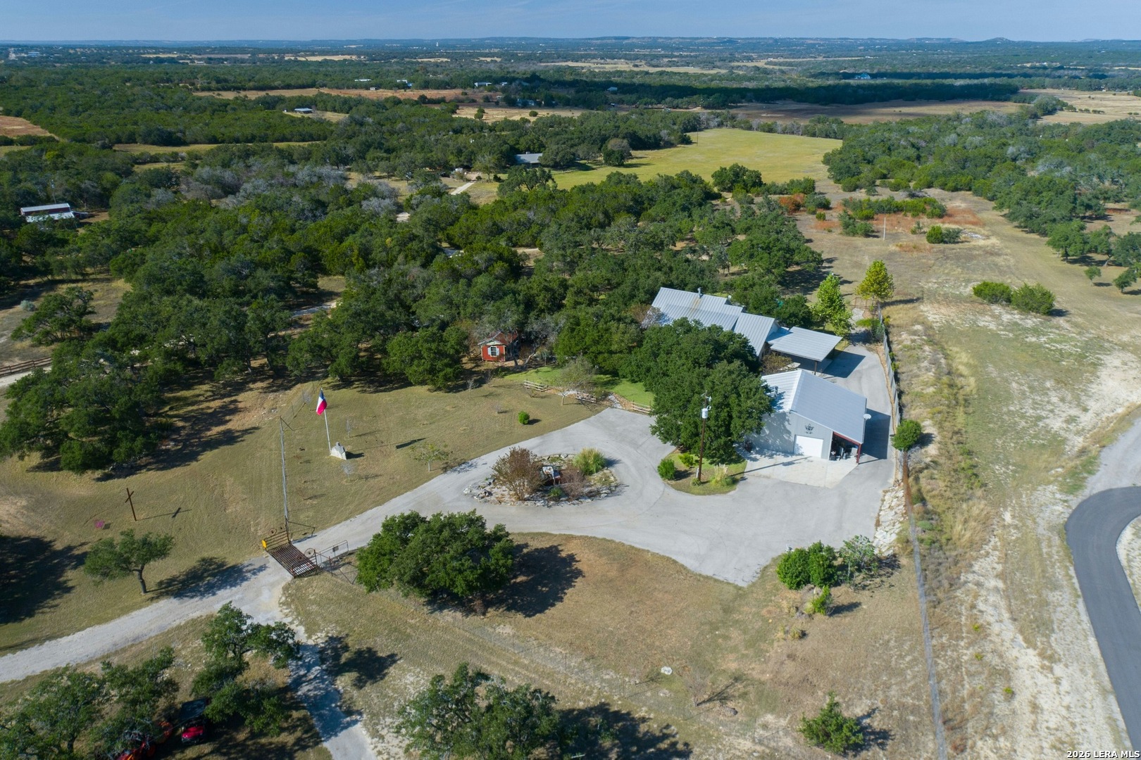 316 Go Away Road Blanco, TX 78606 - Photo 4 of 40 an aerial view of a houses with outdoor space