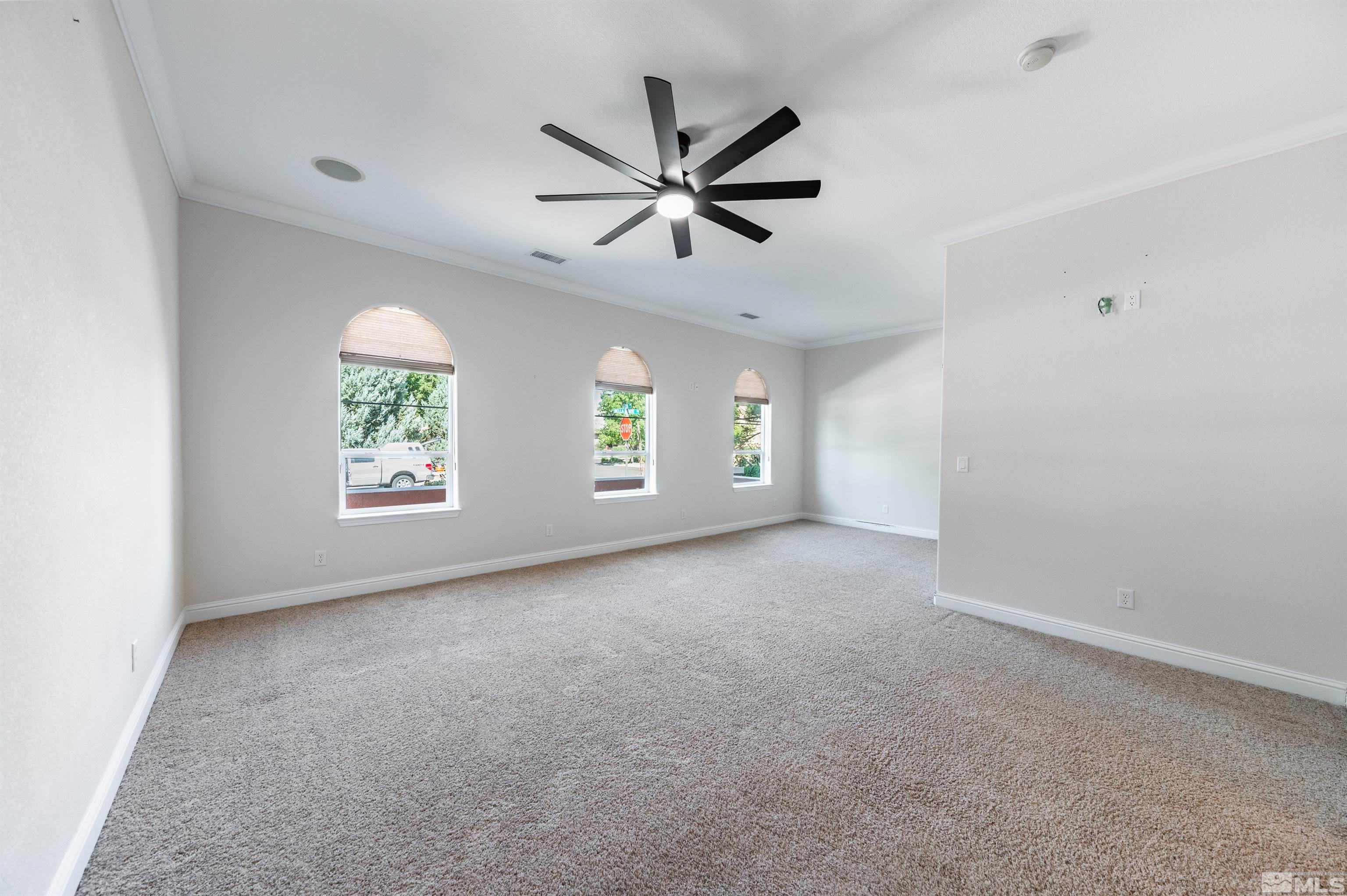 985 Bella Monte Drive Minden, NV 89423 - Photo 15 of 37 an empty room with windows and fan